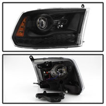 Load image into Gallery viewer, xTune Dodge Ram 13-17 ( w/ Factory Projector LED) Projector Headlight - Black HD-JH-DR13-P-BK