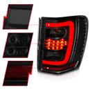 ANZO 1999-2004 Jeep Grand Cherokee LED Tail Lights w/ Light Bar Black Housing Smoke Lens-2