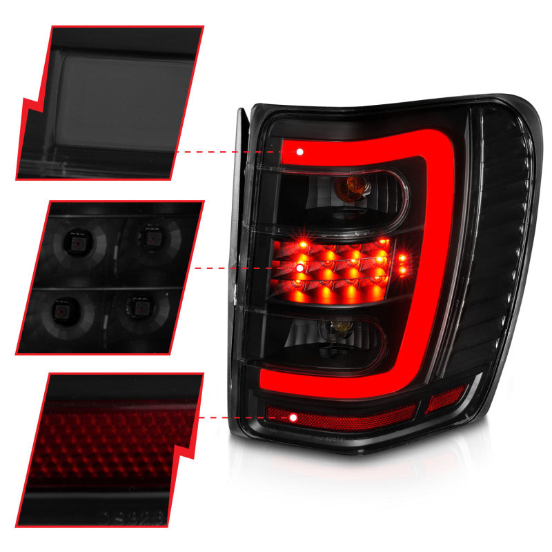 ANZO 1999-2004 Jeep Grand Cherokee LED Tail Lights w/ Light Bar Black Housing Smoke Lens - 0